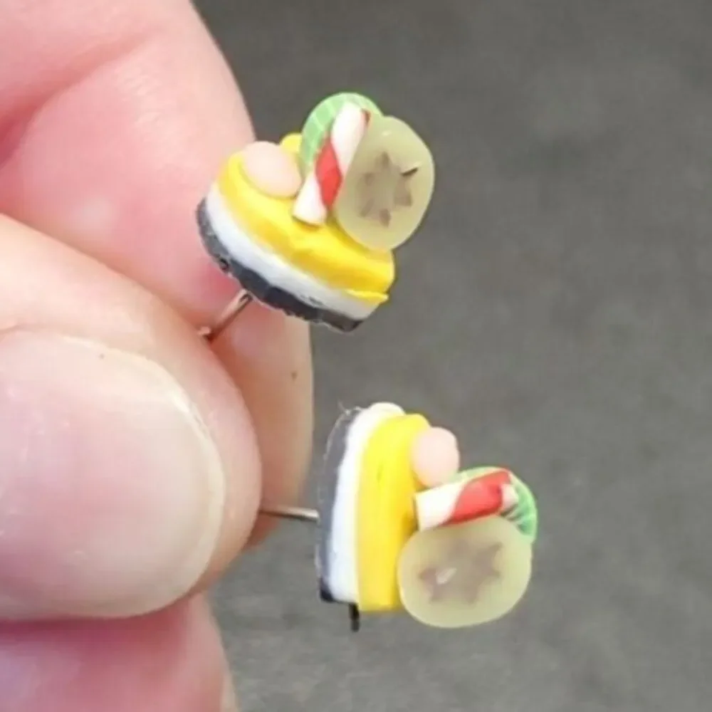 Silver tone heart-shaped dessert earrings